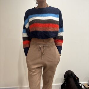 Colorful Striped Sweater and Tan Pants
